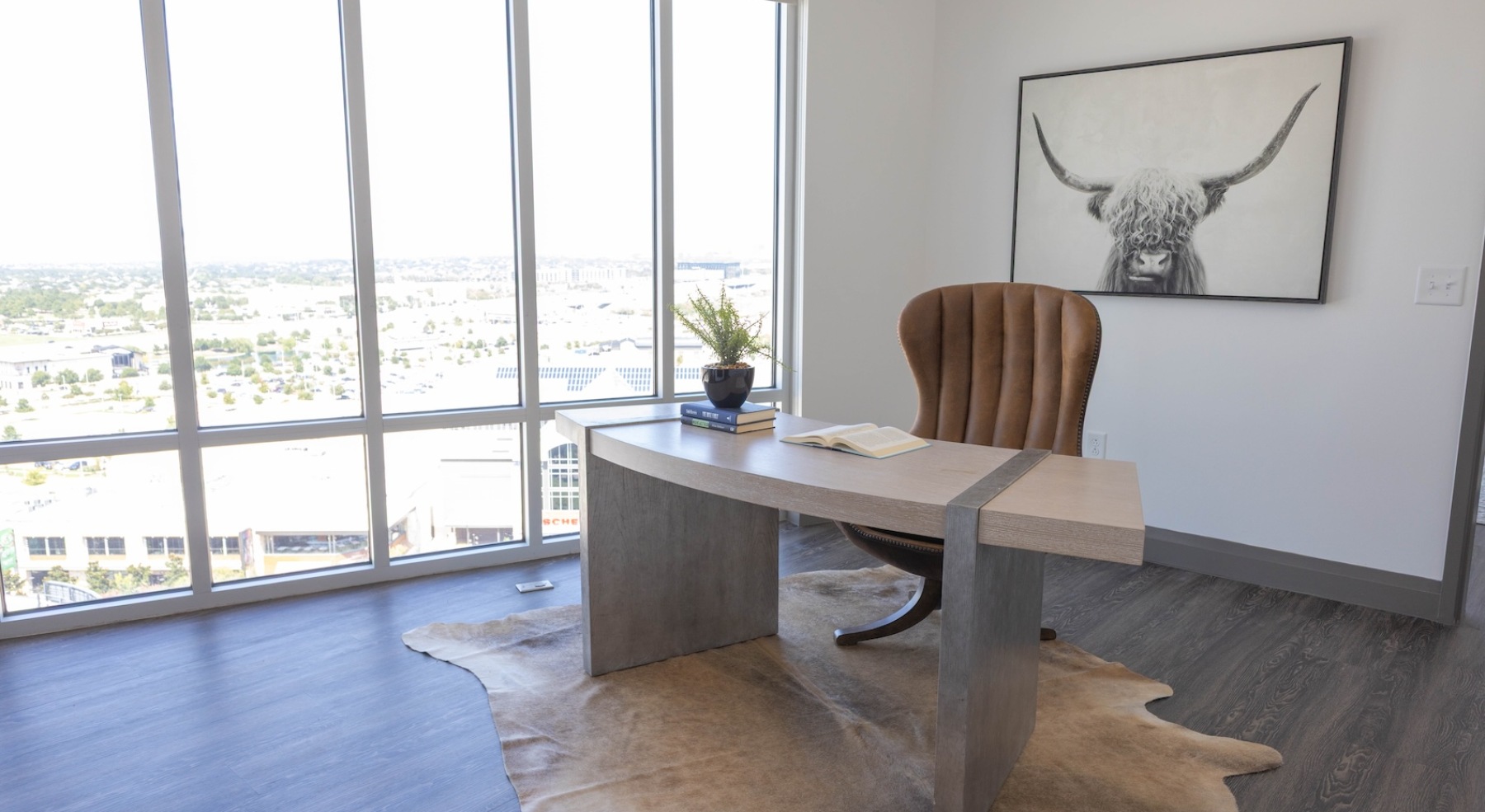 A spacious study with amply lighting and floor-to-ceiling windows