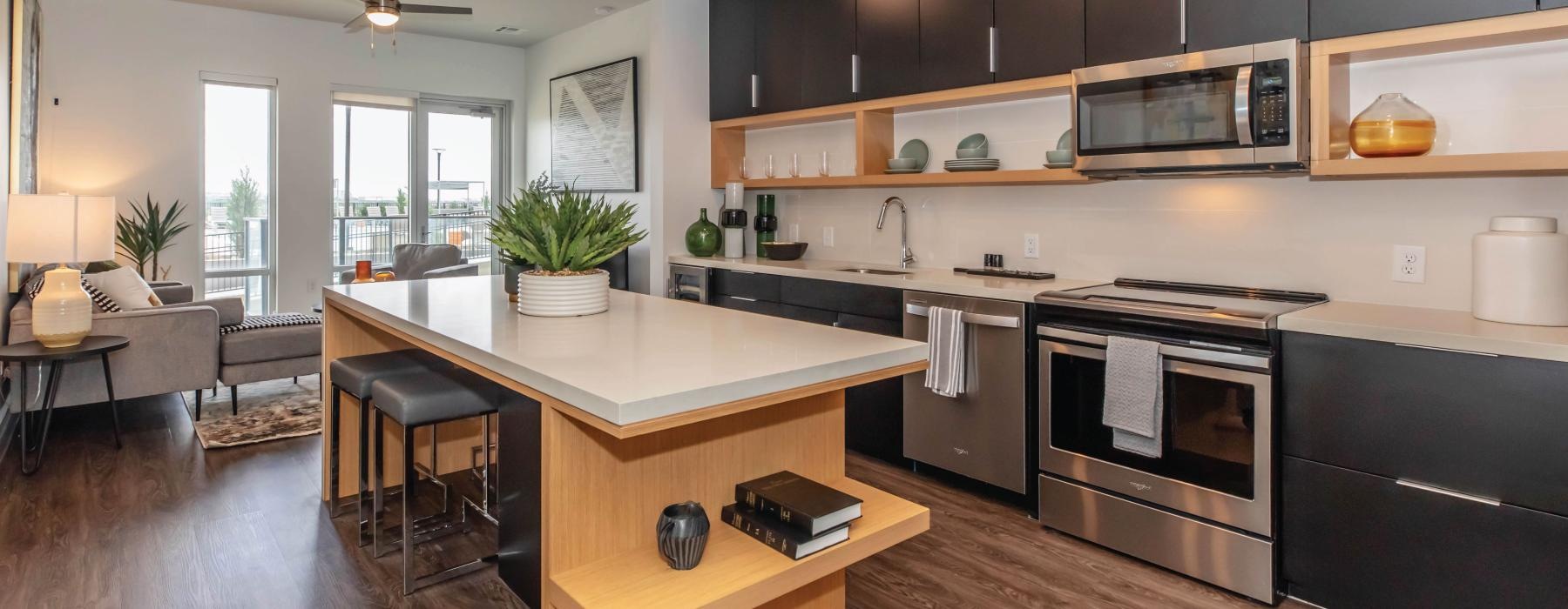 a kitchen with a island and oven