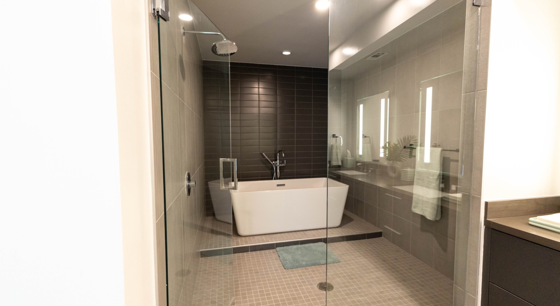 a spacious bathroom with a walk-in shower
